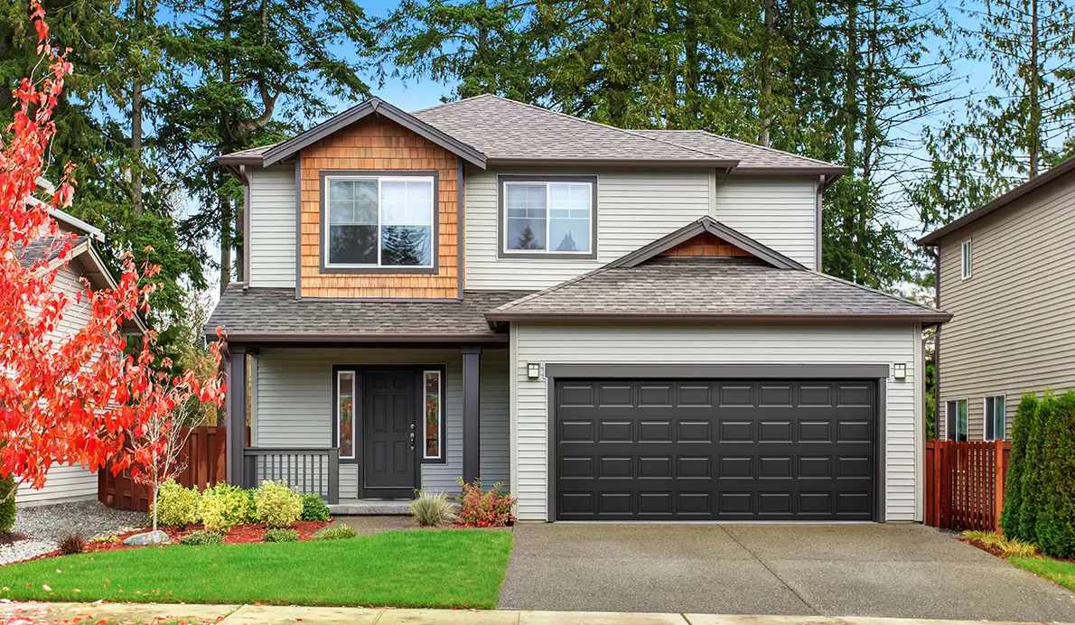 Classic steel garage door on a home exterior