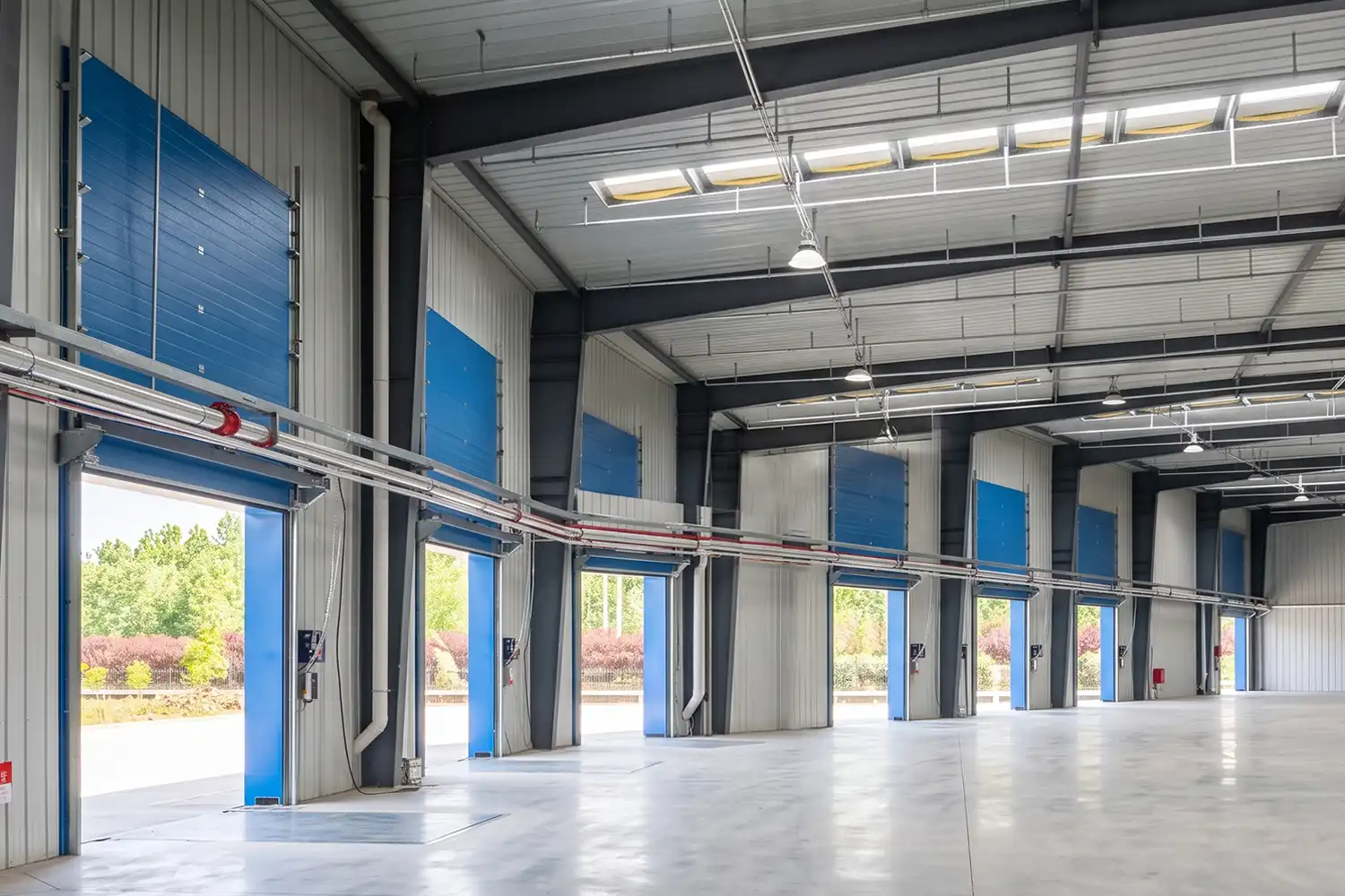 Industrial sectional garage doors on a commercial facility